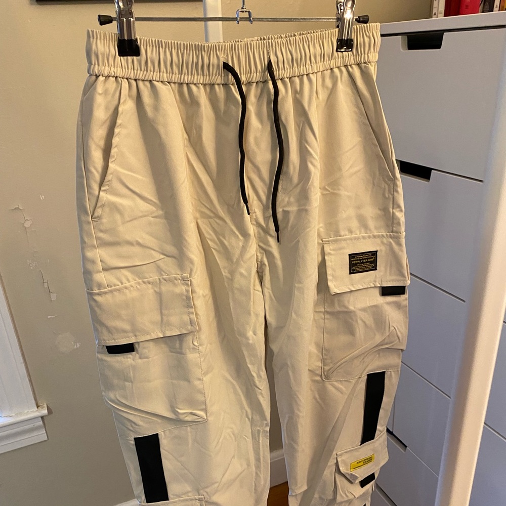 Cream cargo pants with black detail